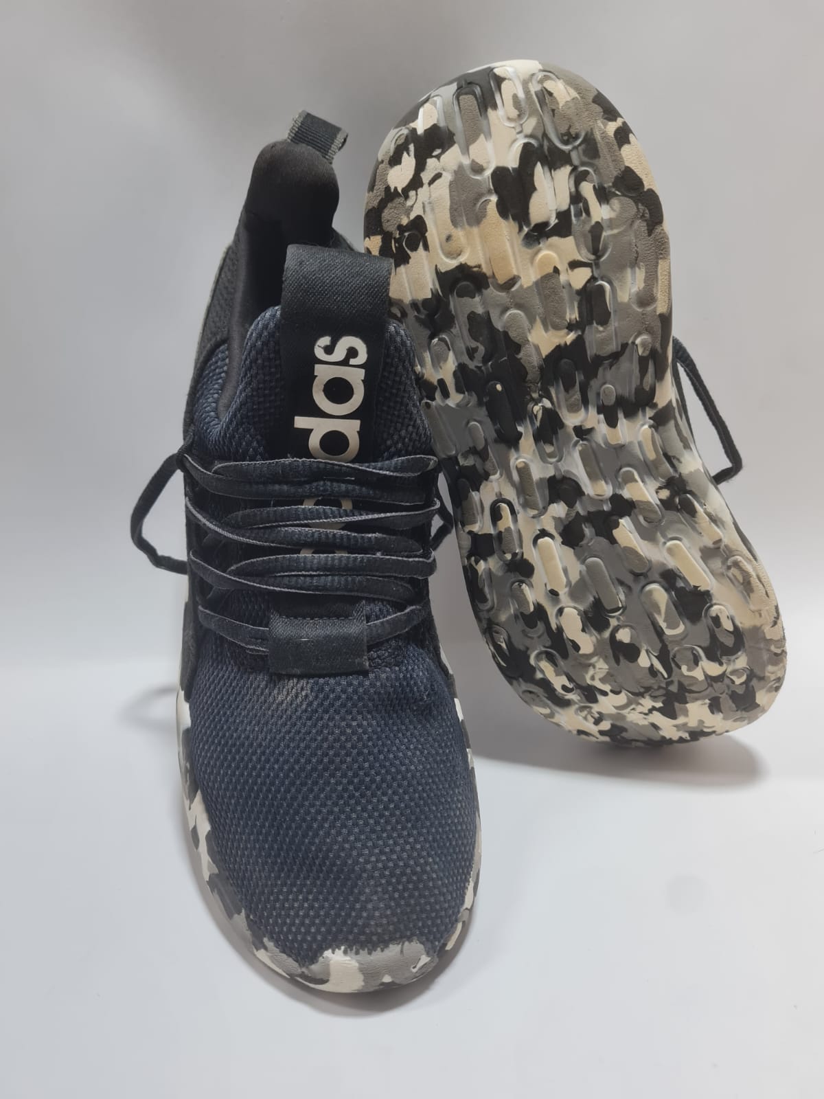 Adidas Lite Racer Adapt 7.0 sneakers.